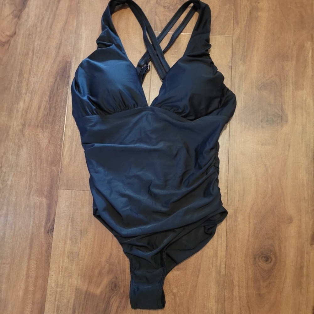 Sleek Black One-Piece Swimsuit with Plunging Neckline and Criss-Cross Back